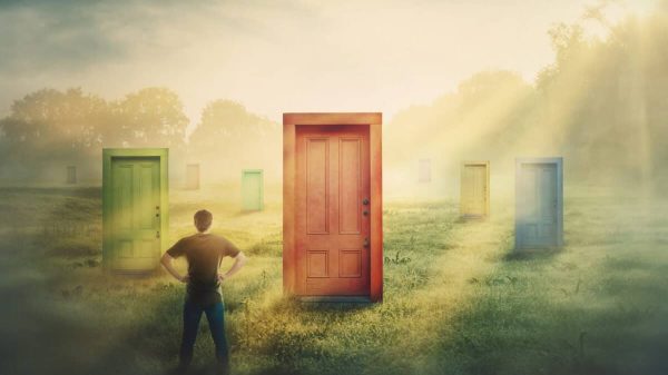 Canadian investor contemplating U.S. stocks with multiple doors to choose from.