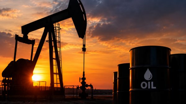 Sunset Pumpjack and Oil Barrels