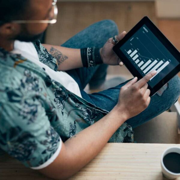 An investor uses a tablet