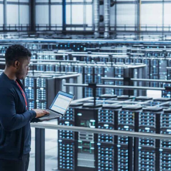 Data Center Engineer Using Laptop Computer crypto mining